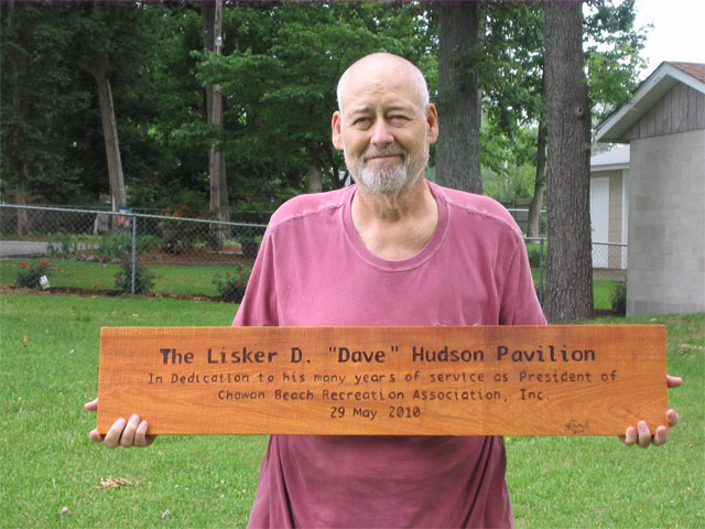 Dave                                                           Hudson Holding                                                           commemorative                                                           plaque